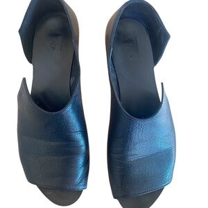 Walk by Anat Dahari are a handmade black leather slip on sandals